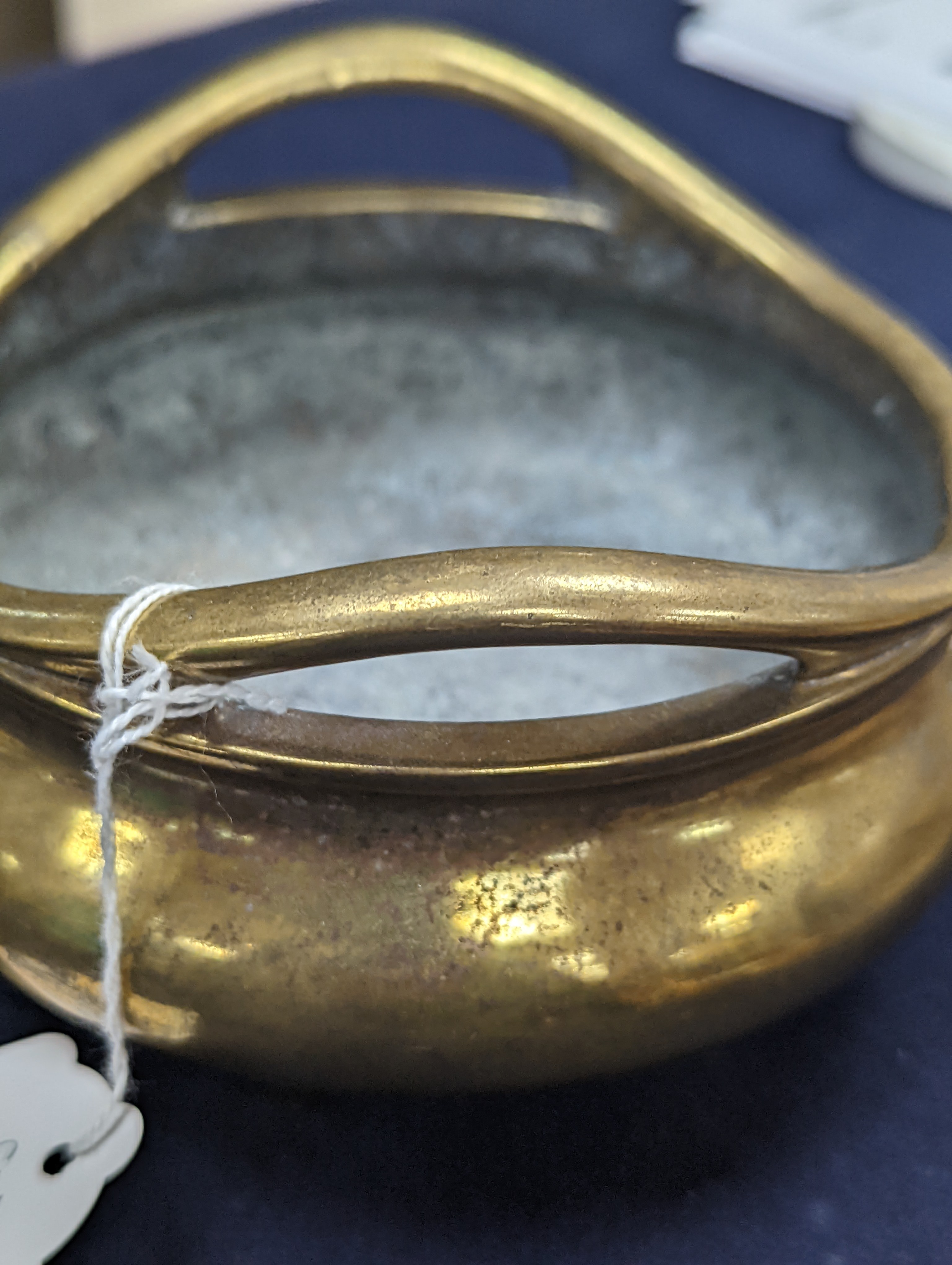 A Chinese bronze ding censer, Xuande sixteen character mark but 19th century, diameter 15cm